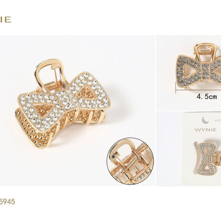 Goudkleurige haarklem 4.5 cm met strass strik design voor haarstyling